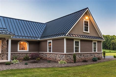 blue house with brown metal roof|brown roof house color scheme.